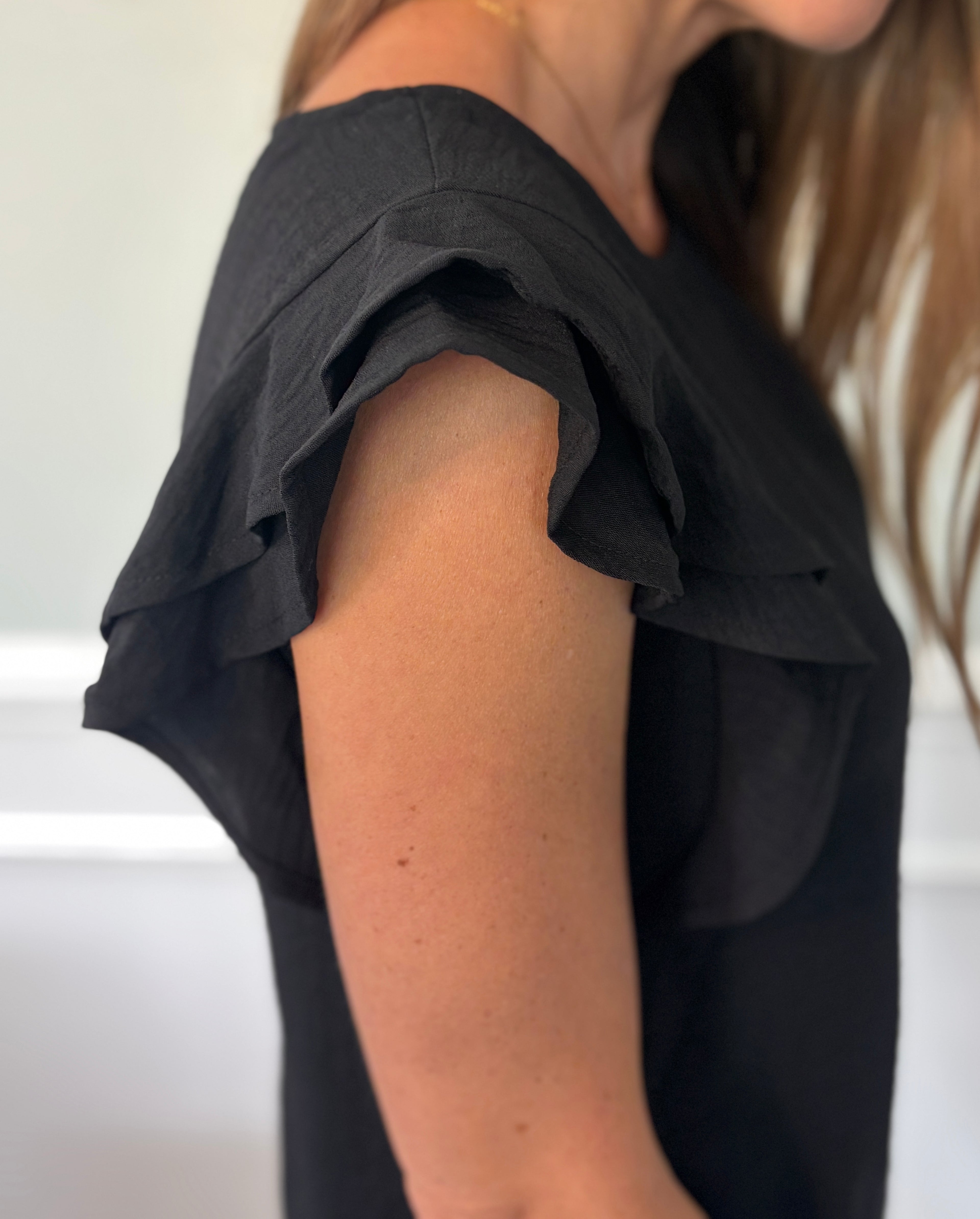 Flutter Sleeve Top — lightweight flutter-sleeve blouse